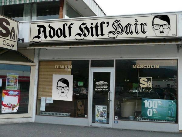 Vous voulez vous faire une petite coupe de cheveux avec la raie sur le côté et la mèche bien rabattue. Avec une petite moustache? Et bien venez chez Adolf Hitl'Hair. Vous ferez Führer!