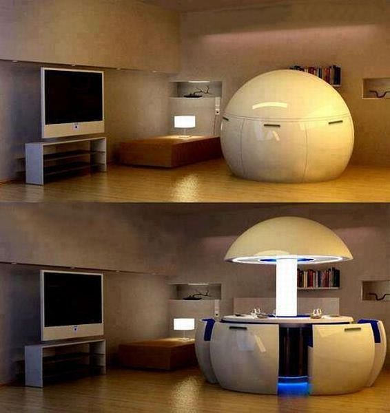 Quand on a un petit espace, on peut avoir besoin d'une cuisine design. Voyez ce salon. Ce n'est pas un salon de footballeur avec un gros ballon au milieu. Non, c'est une cuisine ouvrable (ça change des cuisines ouvertes).