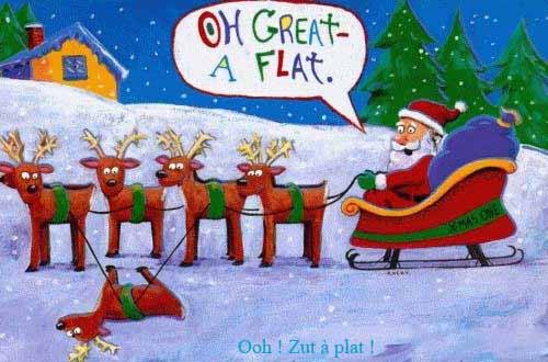 Pas facile pour le Père Noël de changer une roue de son traineau quand il est à plat...